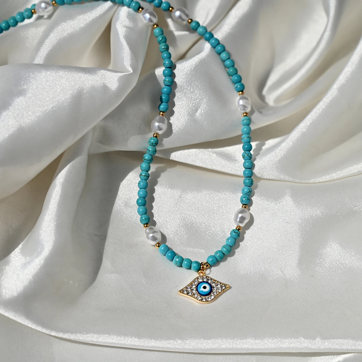 Artificial Turquoise Beads Heart Eye Pendant Necklace For Women With a Golden Stainless Steel Buckle Imitation Pearl Jewelry