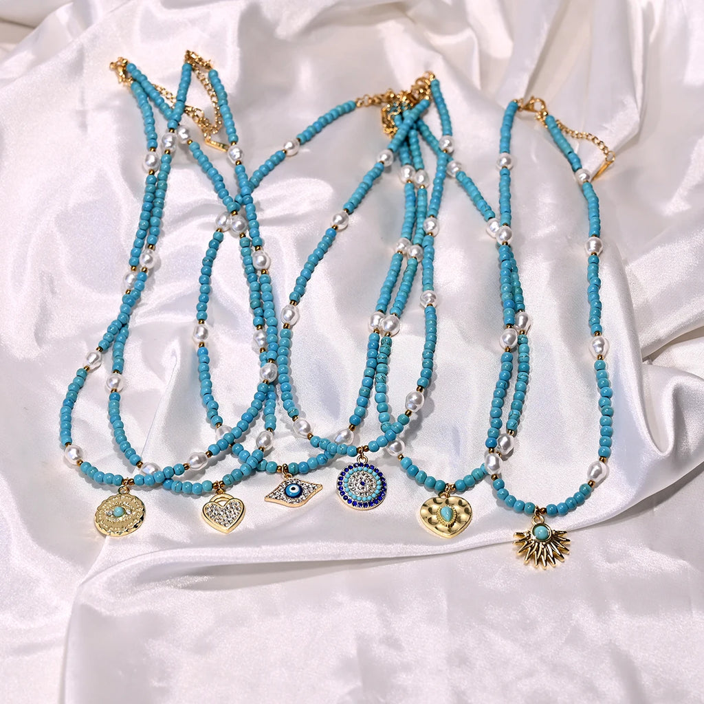 Artificial Turquoise Beads Heart Eye Pendant Necklace For Women With a Golden Stainless Steel Buckle Imitation Pearl Jewelry