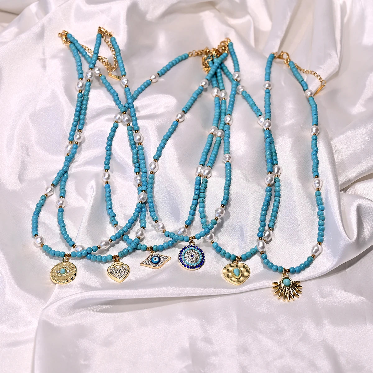 Artificial Turquoise Beads Heart Eye Pendant Necklace For Women With a Golden Stainless Steel Buckle Imitation Pearl Jewelry
