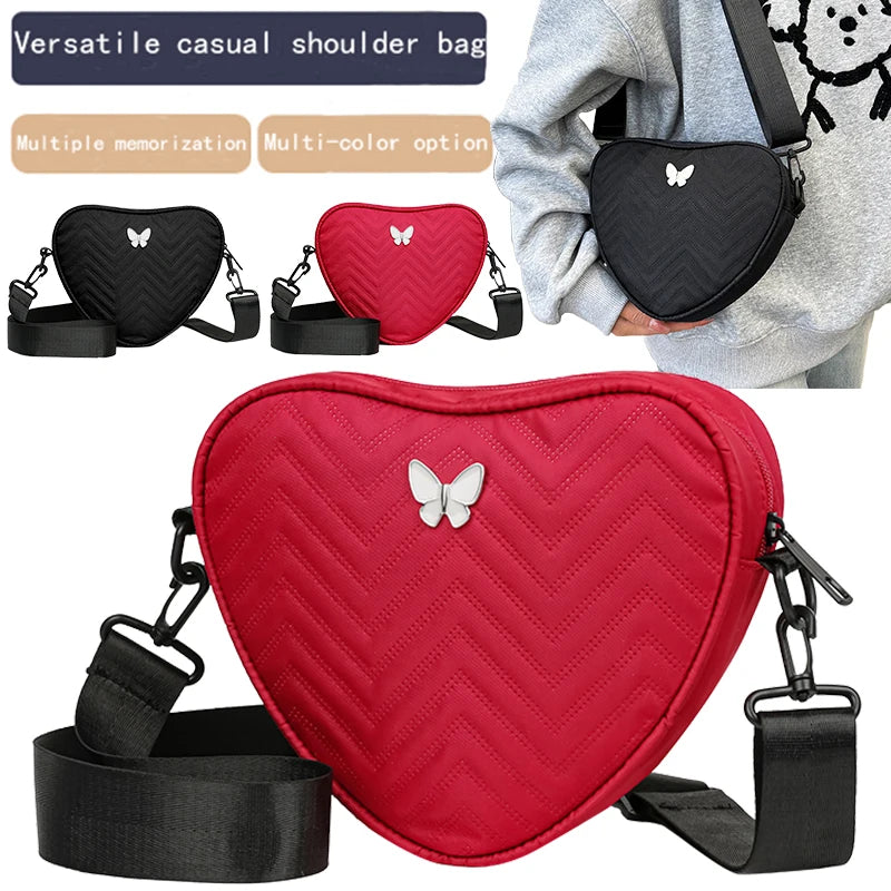 Neutral style shoulder bag for men and women, heart-shaped with butterfly-shaped decoration, suitable for travel.