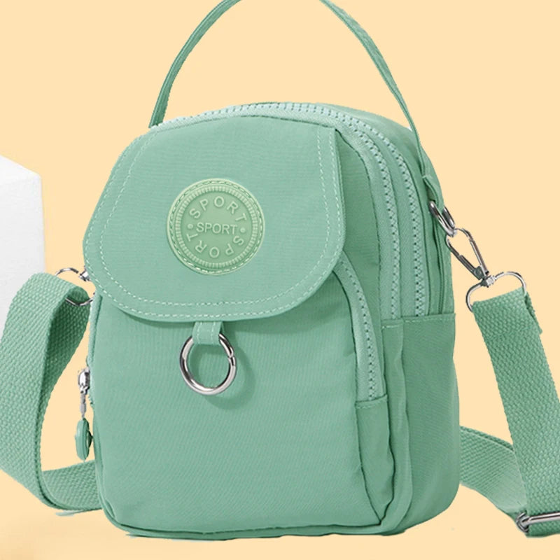 Men's and women's single-shoulder crossbody bags, stylish and casual mini solid-color handbags