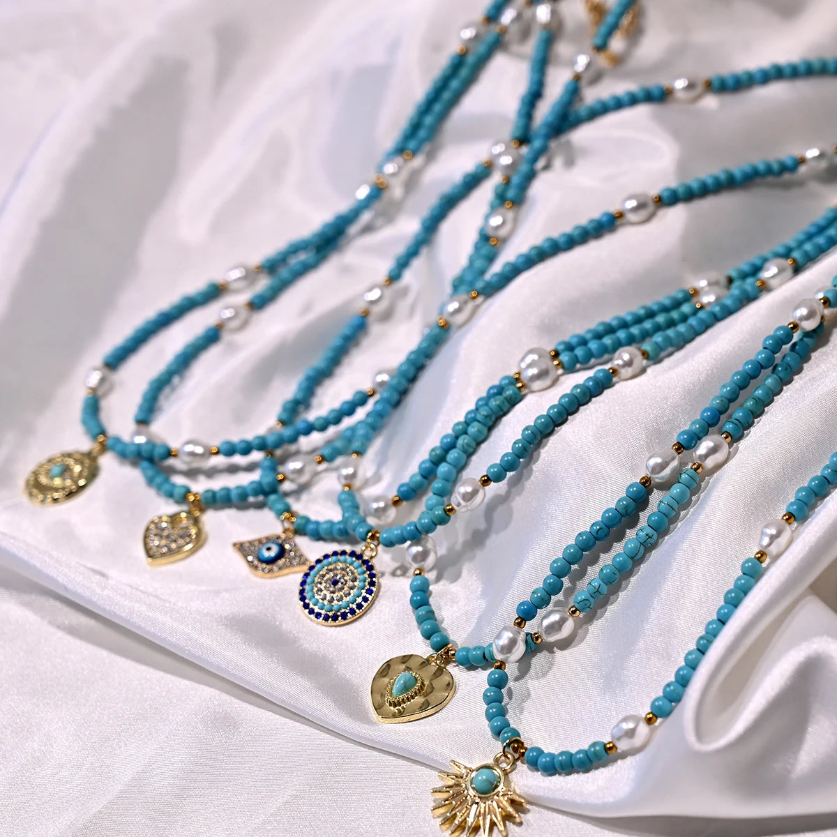 Artificial Turquoise Beads Heart Eye Pendant Necklace For Women With a Golden Stainless Steel Buckle Imitation Pearl Jewelry