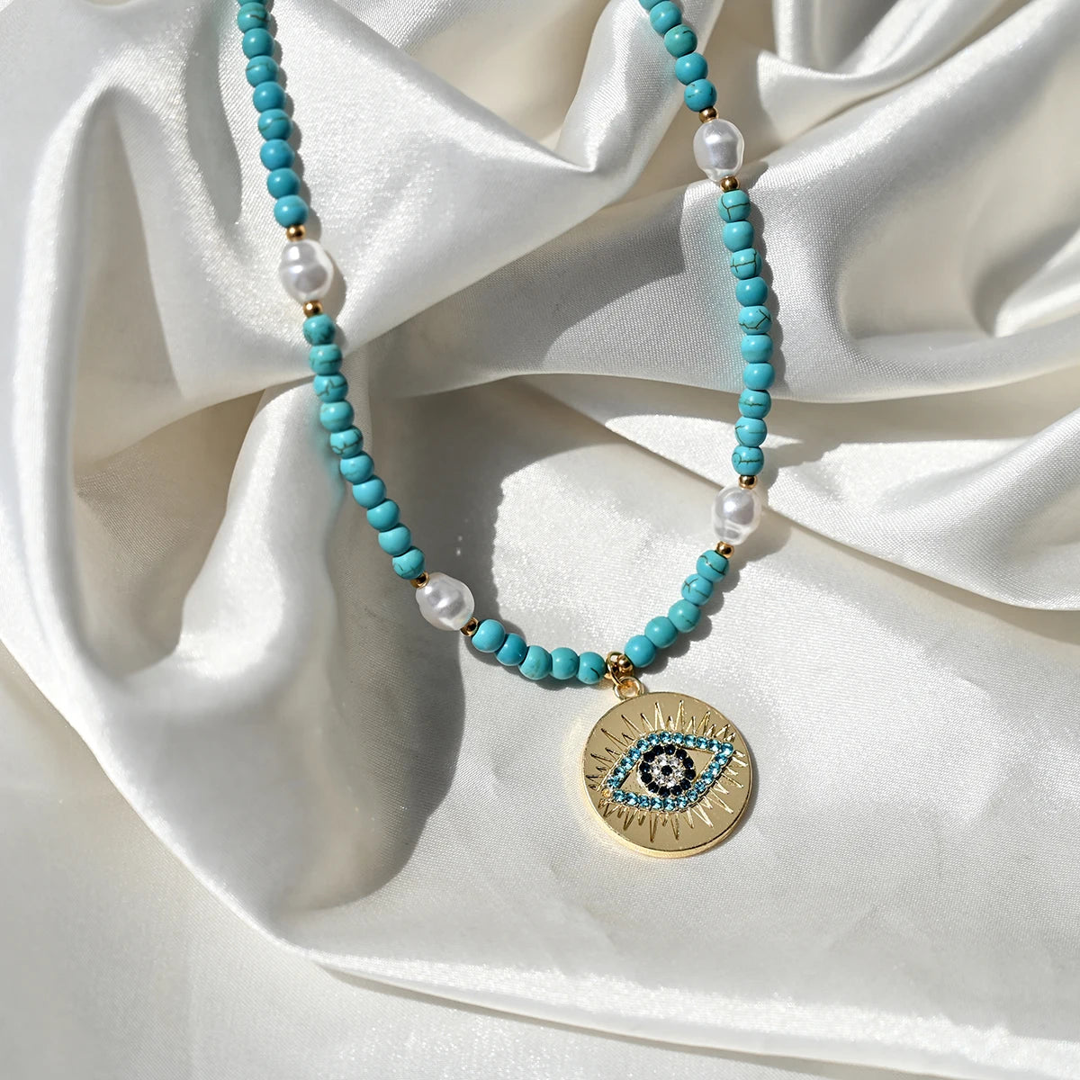 Artificial Turquoise Beads Heart Eye Pendant Necklace For Women With a Golden Stainless Steel Buckle Imitation Pearl Jewelry
