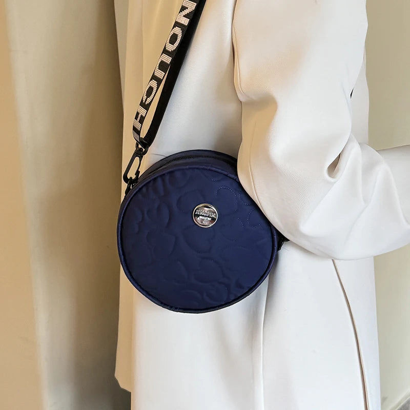 Neutral style rectangular shoulder bag for men and women.The shoulder strap features alphanumeric patterns.Suitable for travel.