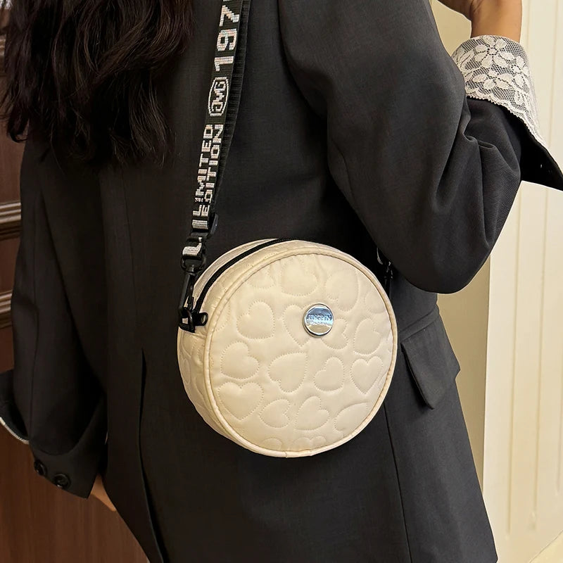 Neutral style rectangular shoulder bag for men and women.The shoulder strap features alphanumeric patterns.Suitable for travel.