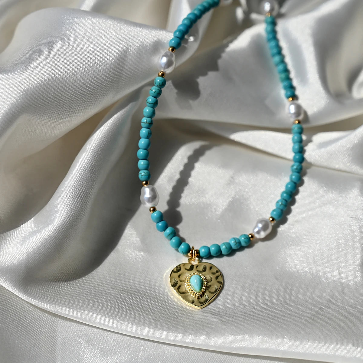 Artificial Turquoise Beads Heart Eye Pendant Necklace For Women With a Golden Stainless Steel Buckle Imitation Pearl Jewelry