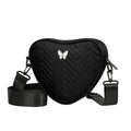 Neutral style shoulder bag for men and women, heart-shaped with butterfly-shaped decoration, suitable for travel.