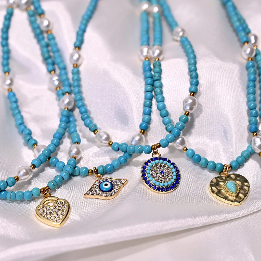 Artificial Turquoise Beads Heart Eye Pendant Necklace For Women With a Golden Stainless Steel Buckle Imitation Pearl Jewelry
