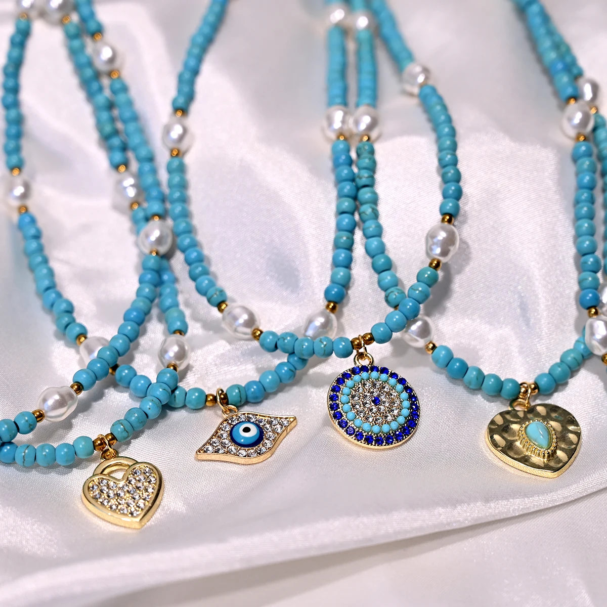 Artificial Turquoise Beads Heart Eye Pendant Necklace For Women With a Golden Stainless Steel Buckle Imitation Pearl Jewelry
